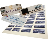 Rectangular Domed Vinyl Stickers in white for promotions in the public sector and charities